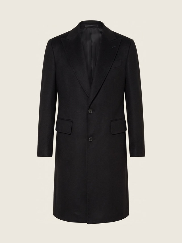 Black overcoat, studio packshot