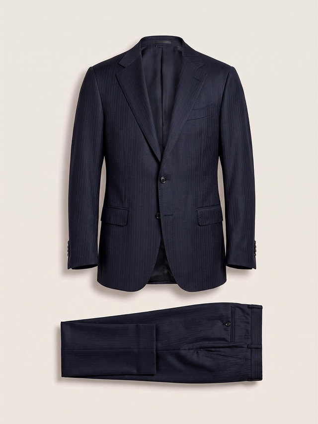 Navy herringbone suit, studio packshot